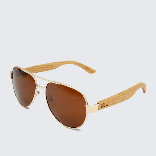 Moana Road Magnum sunglasses with bamboo arms, gold coloured frames and brown polarised lenses